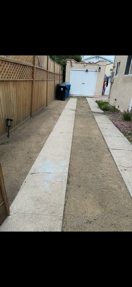 Walkway to storage and yard - 10832 Westminster Ave