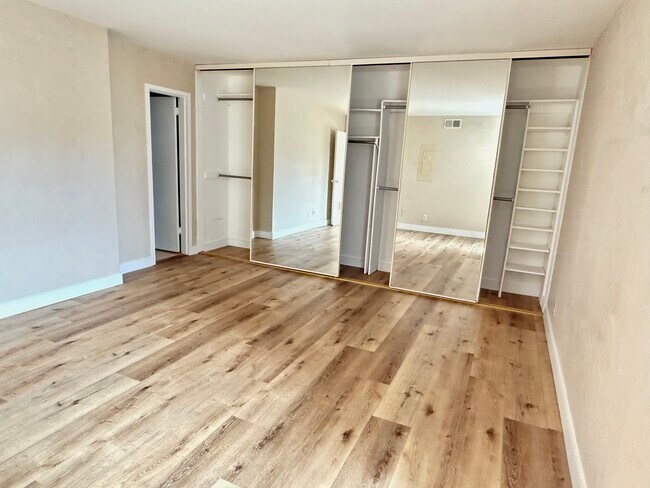 Bedroom view with Closet - 100 S Doheny Dr