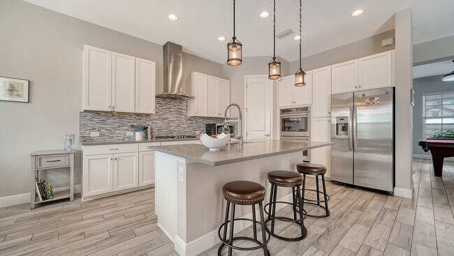 Building Photo - Furnished 4-Bedroom Home with Pool in The Sought After Neighborhood Of Rivo Lakes!!