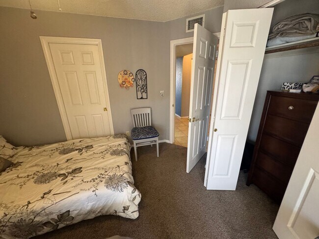 Building Photo - FURNISHED 2BR CONDO w/Utilities Water View Gated NO STAIRS