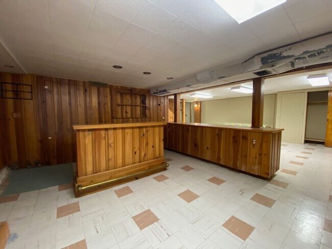 Building Photo - Welcome to this charming three-bedroom, tw...