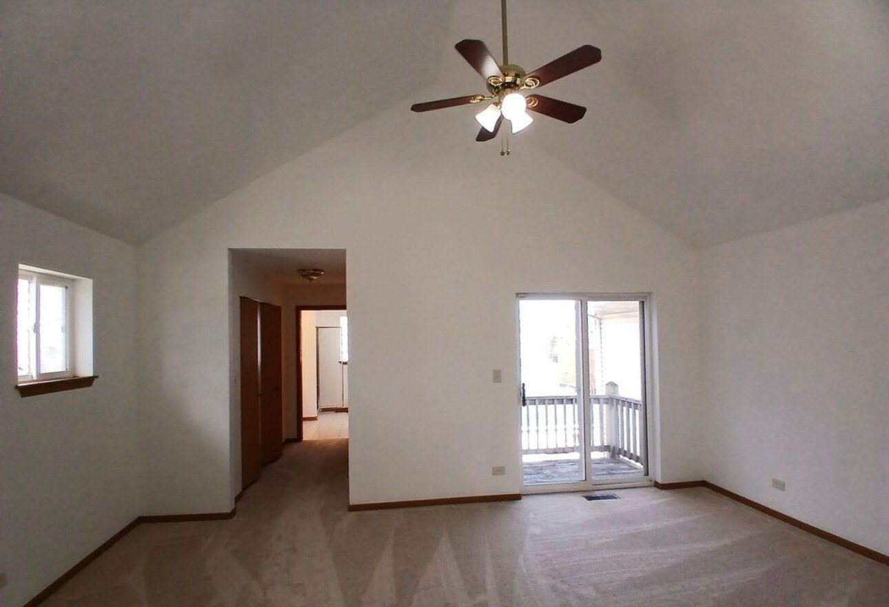 master bedroom with porch - 1500 E 72nd Pl