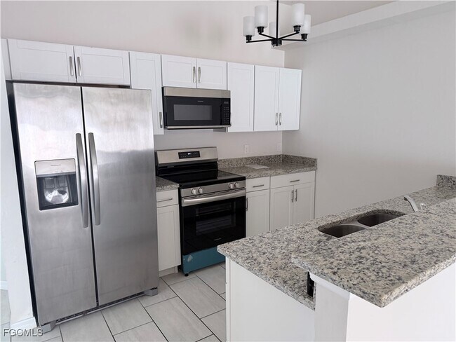 Building Photo - 1210 Cape Coral Pkwy W