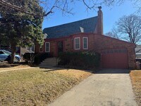 Building Photo - Charming Brick Ranch with Finished Basement & Fenced Yard
