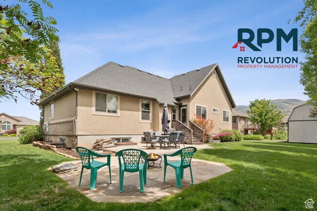 Building Photo - "Spacious 6-Bed Gem with Granite Touches & Cozy Fireplace in Morgan!"