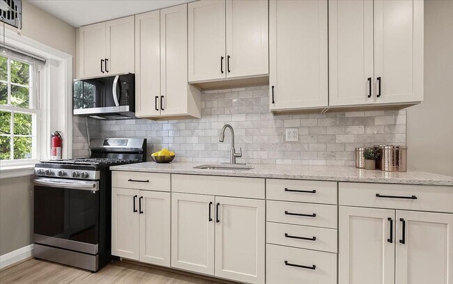 Building Photo - Updated 3BR Catonsville Townhome | Rear Parking + Deck