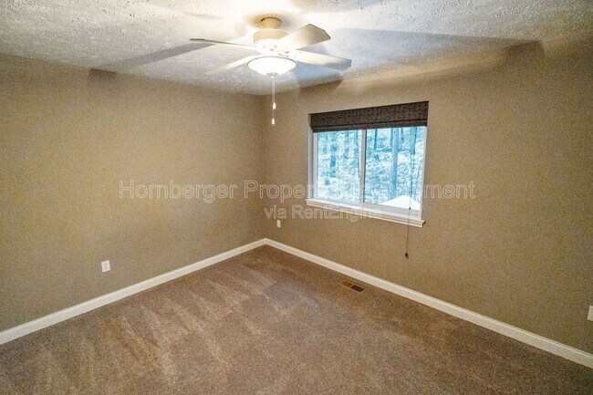 Building Photo - 6415 S Woodland Ct