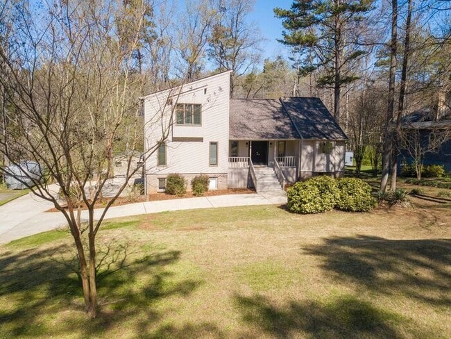 Building Photo - Spacious 4-Bedroom Mint Hill Retreat with Fireplace, 2-Car Garage & 3,600+ Sq Ft