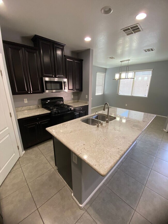 Building Photo - AMERICANA Property Mgmt - Beautiful 4 beds...