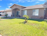 Building Photo - "Spacious 4-Bedroom, 2 Bathroom Home in Oc...