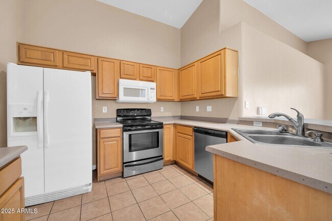 Building Photo - 8544 W Cherry Hills Dr