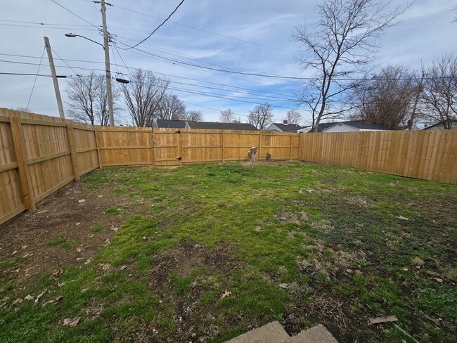 Building Photo - Corner Lot. Fenced Yard. Smells Like Fresh Paint & Good Decisions