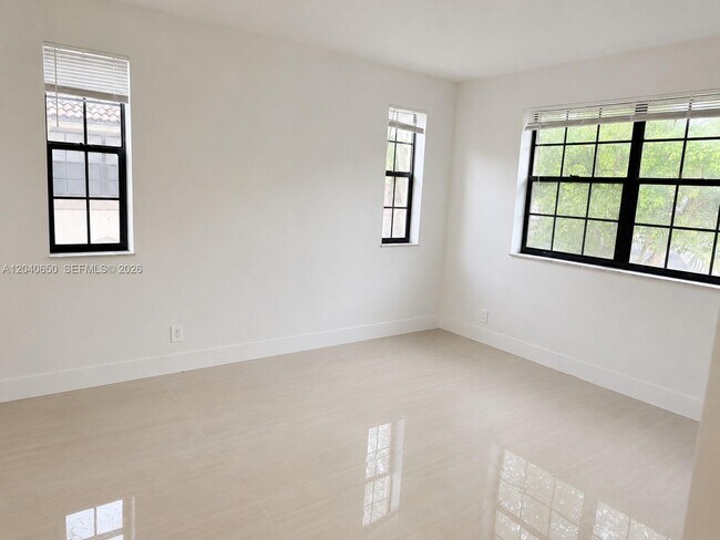 Building Photo - 2830 Coral Springs Dr