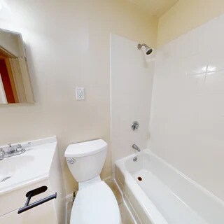 Building Photo - Flats on Comm