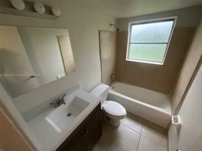 Building Photo - 3090 Coral Springs Dr