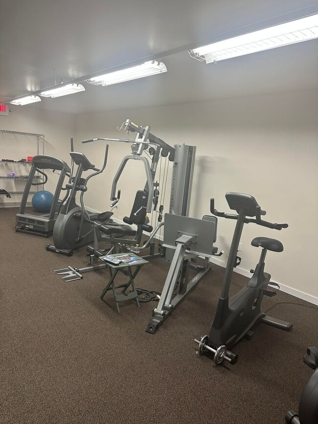 Building Photo - SAVE MONEY ON EXTENDED STAYS.  Beautiful Furnished and Completly Supplied Condo in Downtown Misso...