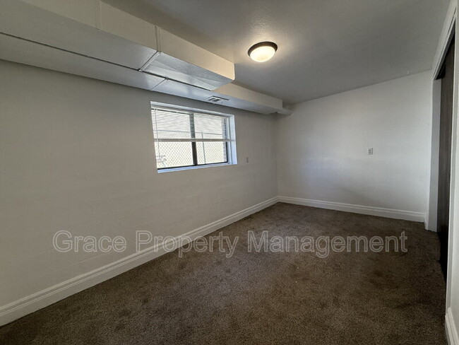 Building Photo - 1149 E 58th Ave