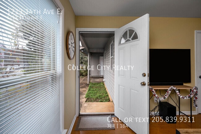 Building Photo - 1213 14th E Ave