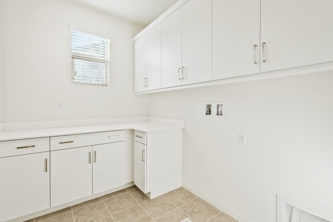 Building Photo - Beautiful newly built 4 bedroom, 3 bath home in the quiet, gated community of Westgate!