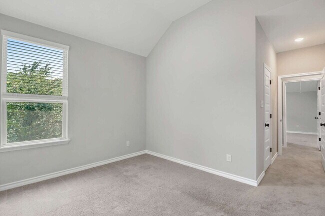 Building Photo - "Spacious 4-Bedroom Sanctuary with Cozy Fireplace in San Antonio's Prime Location!"