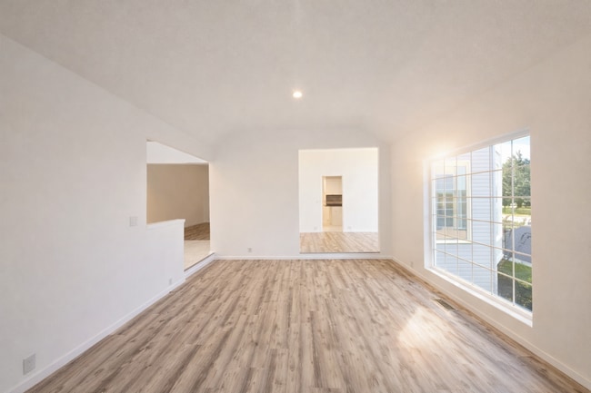 Building Photo - Executive 3 Bed Home with 3 Car Garage & Private Fenced Yard