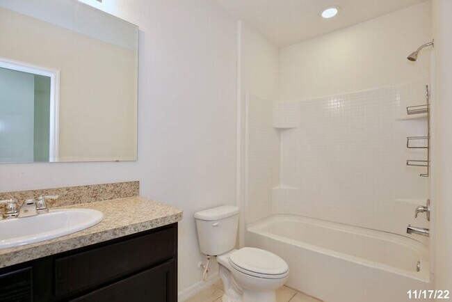 Building Photo - Spacious 3/2.5 Townhome with a 2 Car Garage and a Beautiful Pond View in Westwood Condos - Orlando!