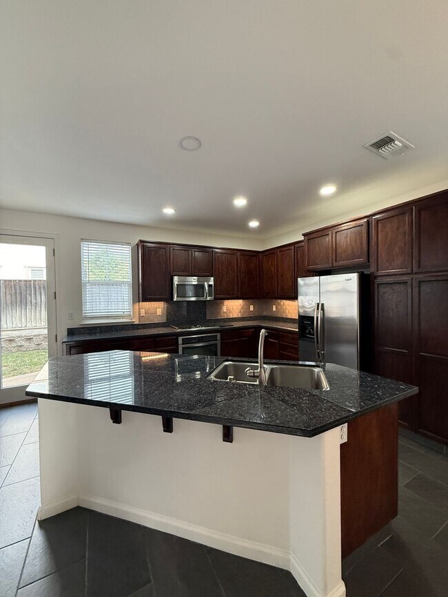 Building Photo - 3 Bedroom, 3.