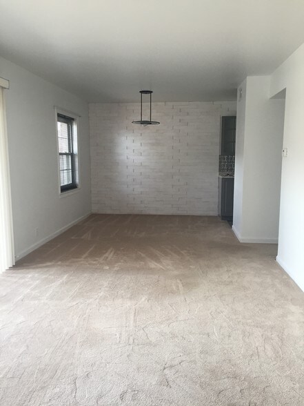 View from living room into dining room - 694 Robinwood Dr