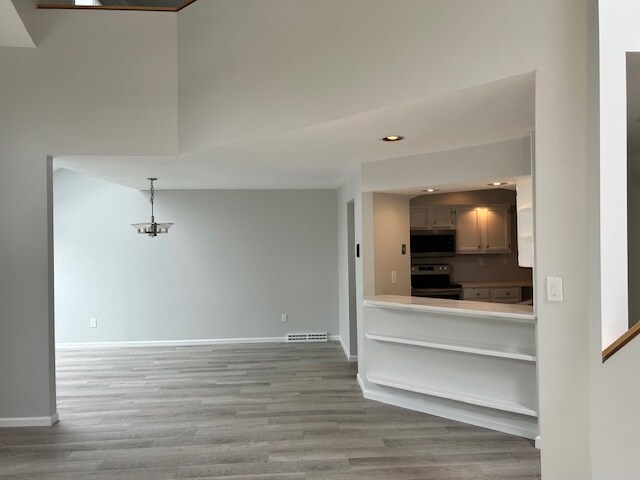 View from Living Room to Dining Room and Kitchen - 42 Pepper Ln