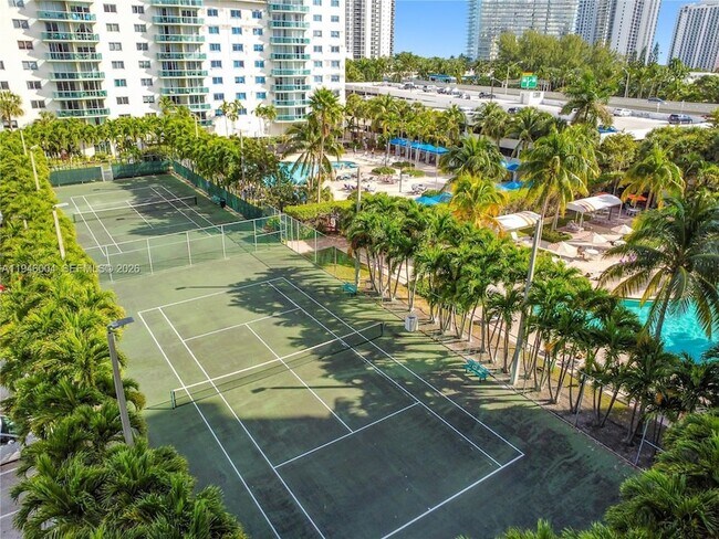 Building Photo - 19380 Collins Ave