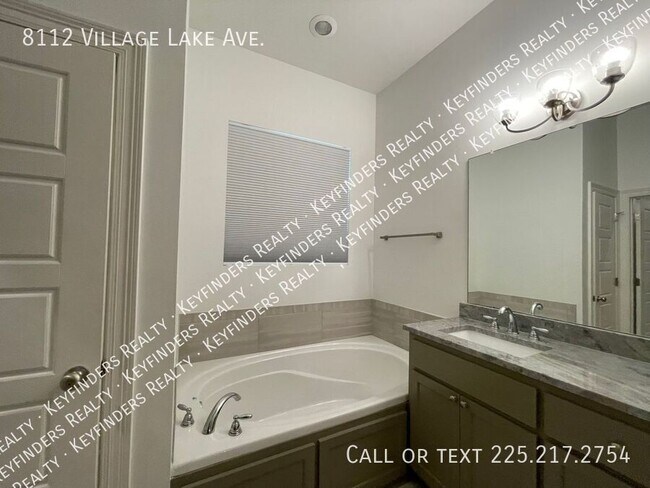 Building Photo - 8112 Village Lake Ave