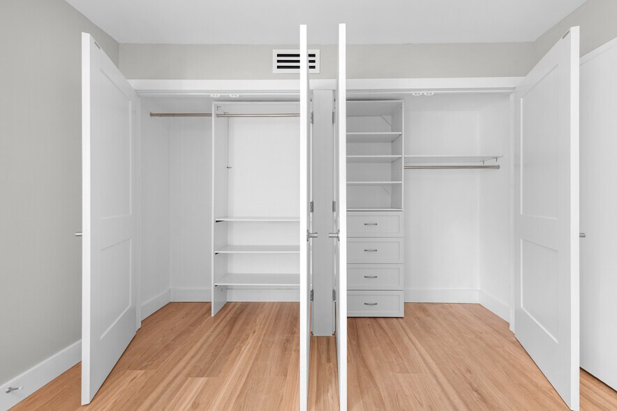 Bedroom Closet with Built In Cabinets - 20333 Detroit Rd
