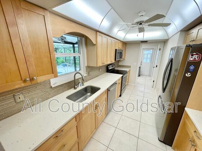 Building Photo - 5163 Lemon Bay Dr