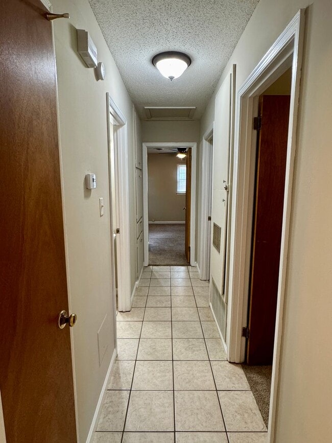 Building Photo - Check Out This 3 Bedroom / 2 Bathroom BRIC...