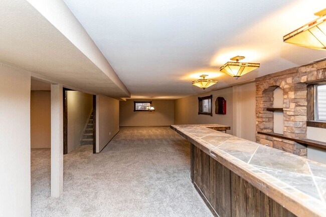 Building Photo - Comfortable Ranch-Style Living with Large Fenced Backyard!