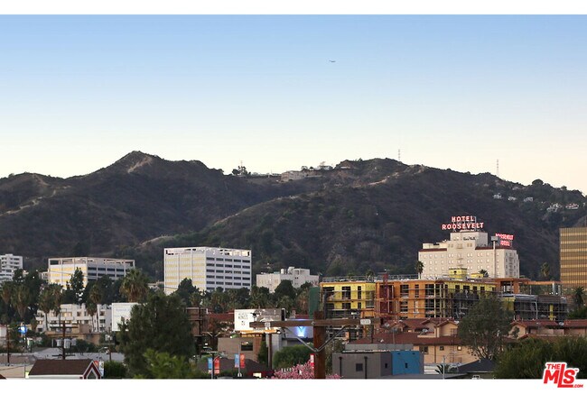 Building Photo - 1211 N Garbo Ln