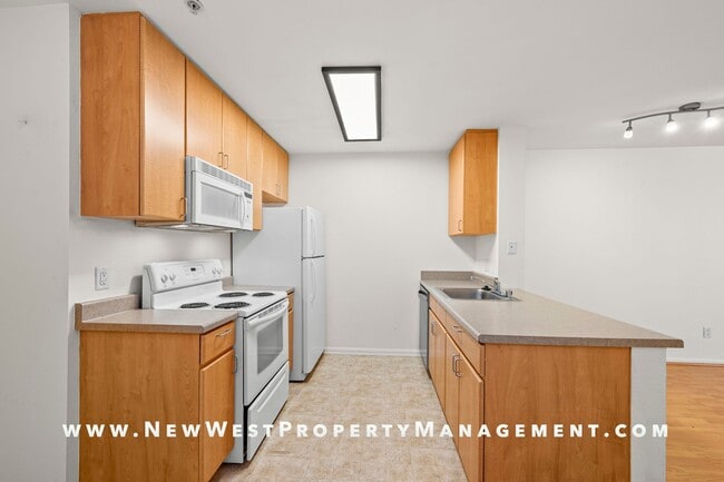 Building Photo - Charming Little Italy 1-Bedroom at Portico! Small Pet OK! Available Now!