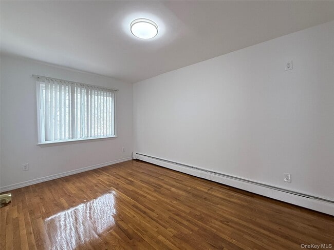 Building Photo - 14-38 144th Pl