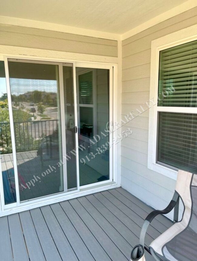 Building Photo - Spacious 4-Bedroom Townhome with Finished Basement in Blue Valley School District-Available NOW!!