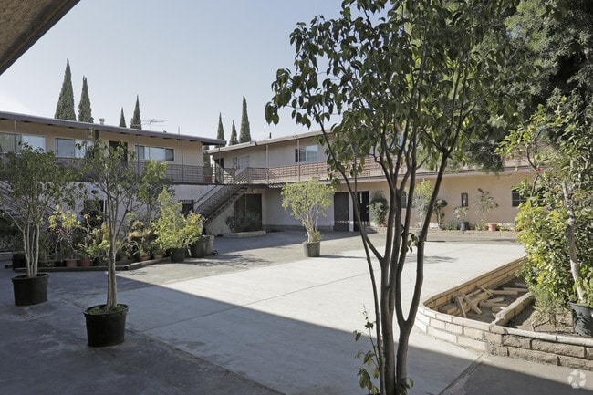 Building Photo - 3030 E Artesia Blvd