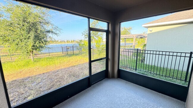 Building Photo - Available NOW! Spacious 4BD/2BA Haven in Villages at Harmony – Your Dream Home Awaits! WASHER & D...