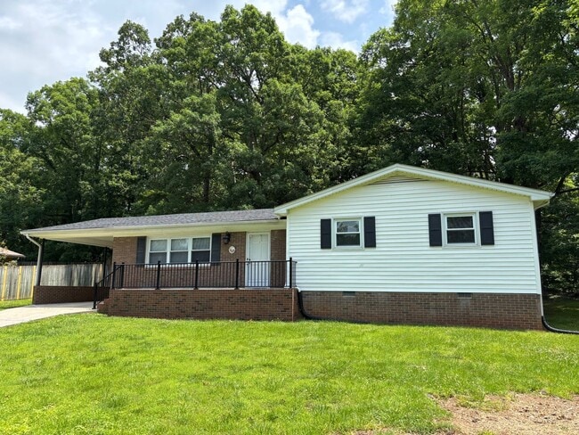 Building Photo - Nice brick home, single carport, storage b...