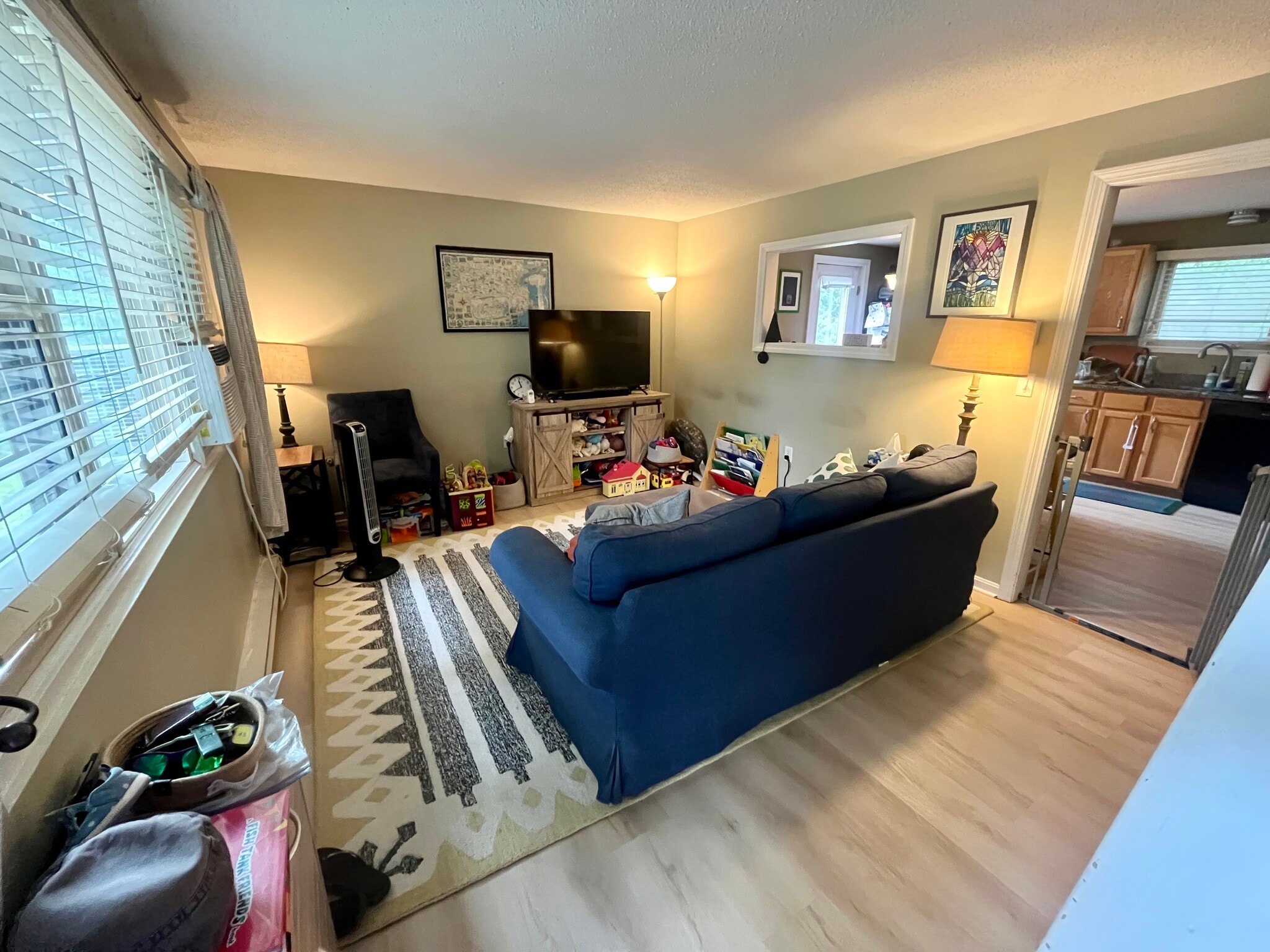 Living room with updated flooring - 98 Hayward St