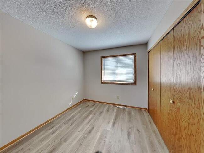 Building Photo - 11051 Quebec Ave N