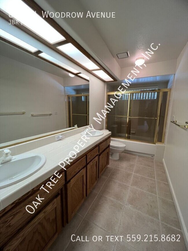 Building Photo - 8820 N Woodrow Ave