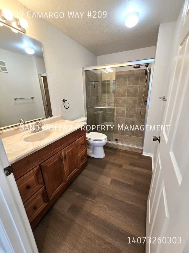 Building Photo - Wonderfully renovated 2nd floor condo in a...