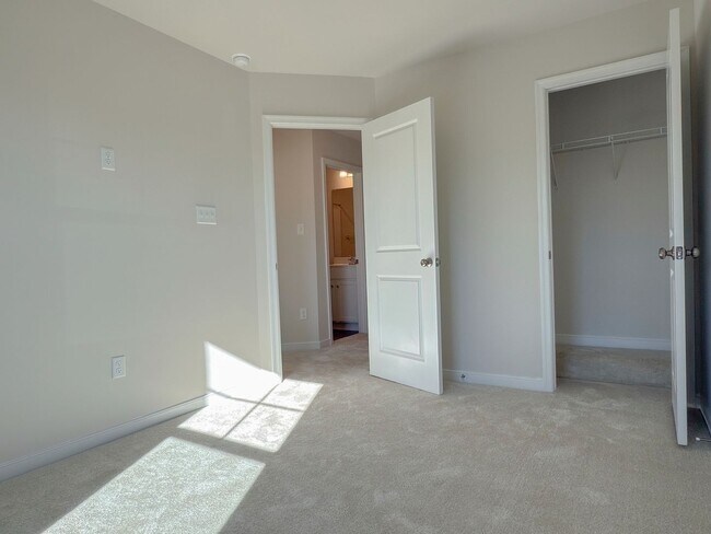 Building Photo - Modern New 3BR Townhome in Hancock Village with Luxury Finishes