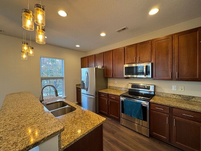 Building Photo - Modern Corner-End Townhome in the Heart of...