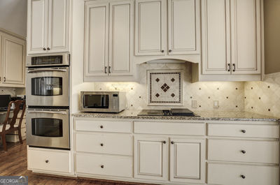 Building Photo - 9485 Nesbit Lakes Dr