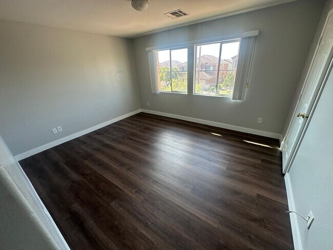 Building Photo - 11588 W Aruba Beach Ave